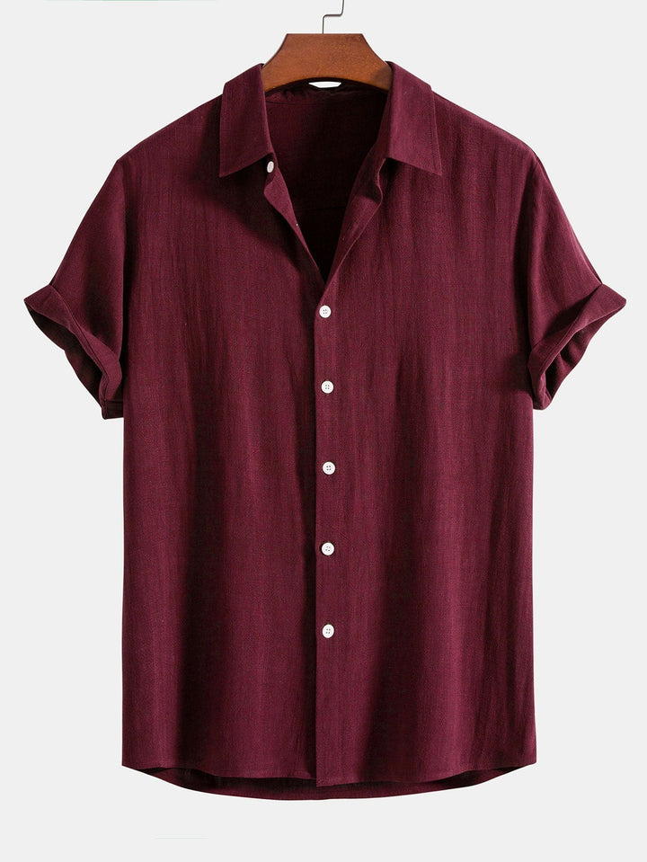 Breathable men's relaxed fit short sleeve button front shirt, ideal for comfortable summer fashion & travel.