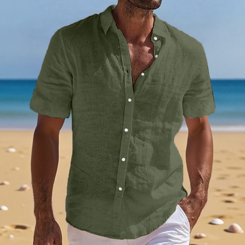 Comfortable men's short sleeve button-up shirt, designed with a relaxed fit for warm weather holidays.