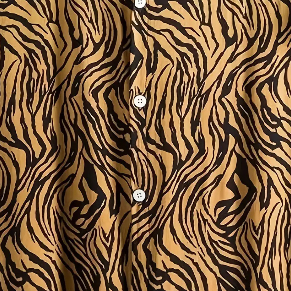 Trendy men's animal print relaxed fit shirt with short sleeves, a stylish choice for summer casual wear.