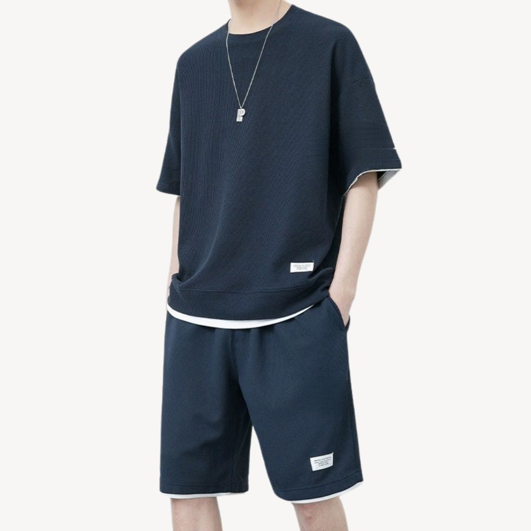 Men's relaxed fit shorts set in a comfortable fabric, perfect for casual summer style and everyday wear.