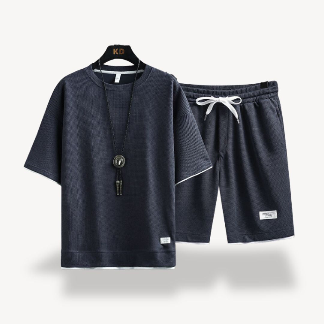 Fashionable men's relaxed fit shorts set, comfortable and stylish for everyday casual summer wear.
