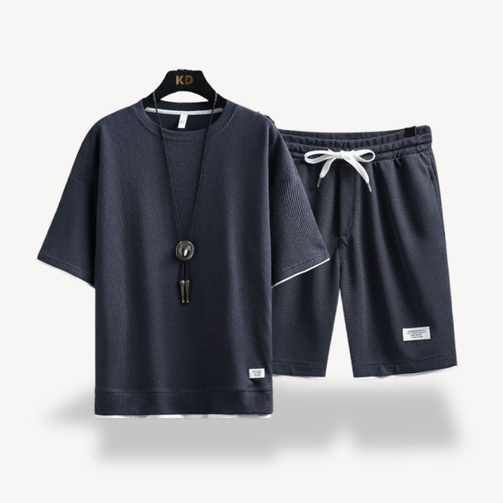 Fashionable men's relaxed fit shorts set, comfortable and stylish for everyday casual summer wear.