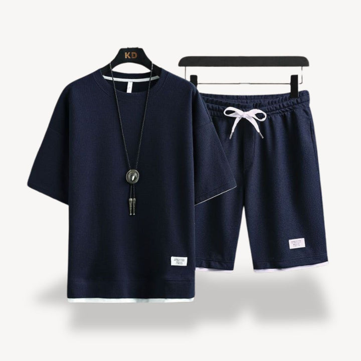 Soft men's relaxed fit shorts set for comfort; a stylish two-piece ideal for summer lounging and casual outfits.