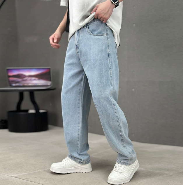 Black men's relaxed fit straight leg denim jeans for versatile casual wear & timeless men's fashion.