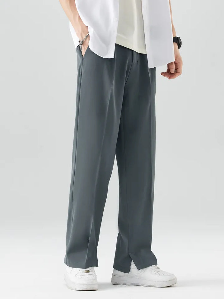 Men's full length straight leg trousers. Relaxed fit chinos offering soft, breathable comfort for casual men's fashion.