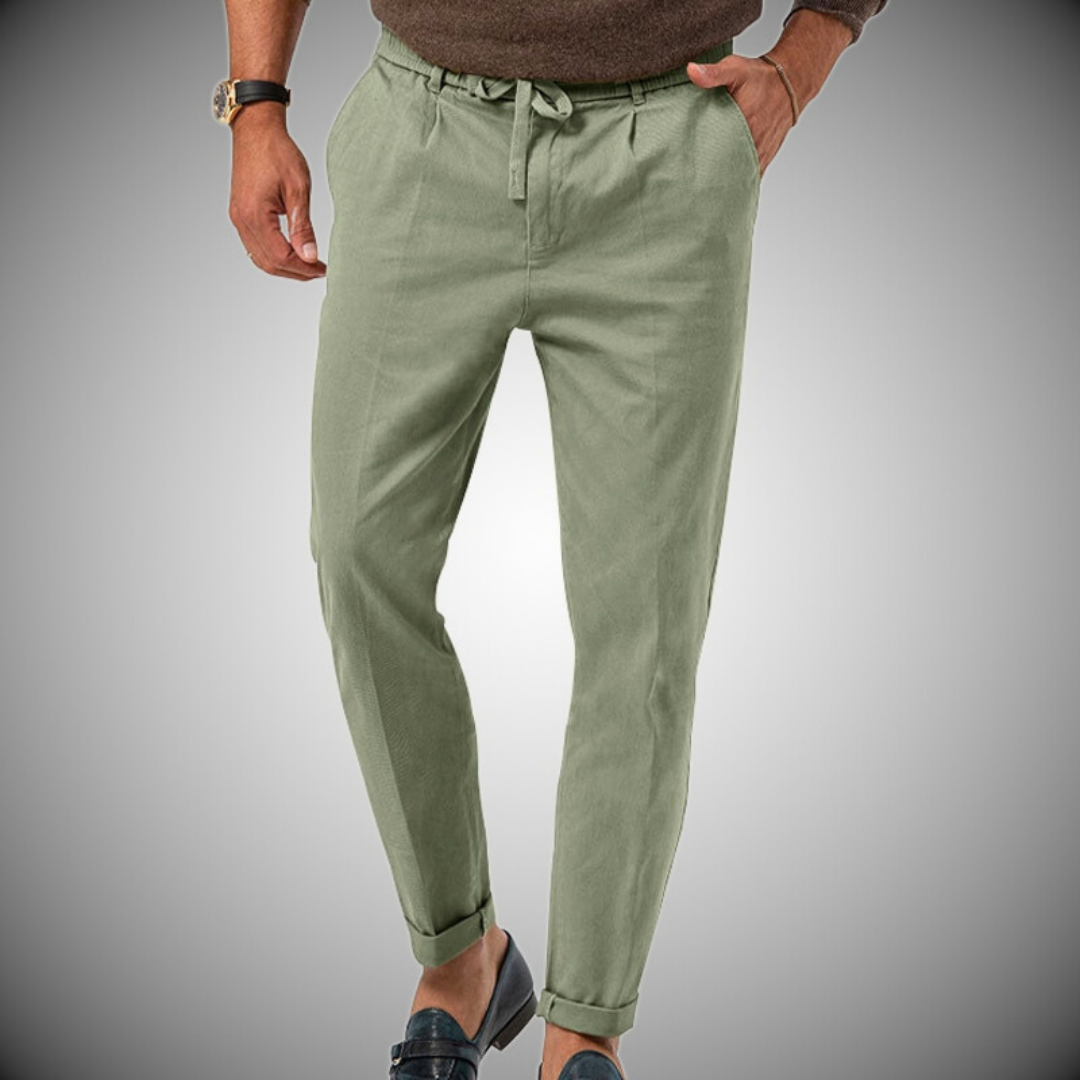 Relaxed fit men's chinos featuring a straight leg and functional drawstring waist for easy style.