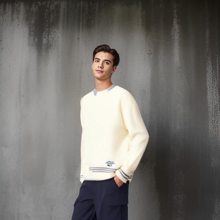 Model wearing a men's relaxed fit striped sweater, a cozy & stylish crewneck pullover for fall.