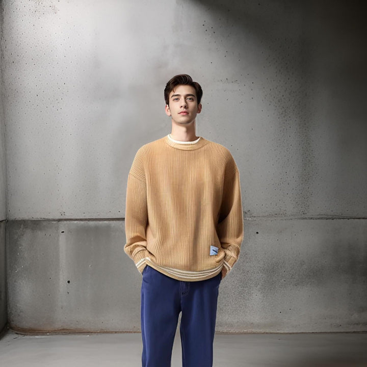 Close-up of a men's striped relaxed fit sweater, highlighting the cozy fabric & stylish pattern.