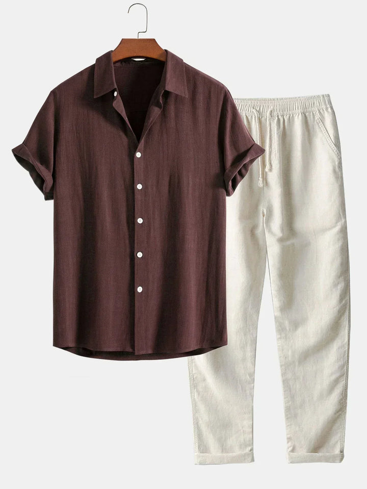 Stylish men's two-piece summer outfit: relaxed button-up shirt & comfortable trousers, ideal for vacation wear.