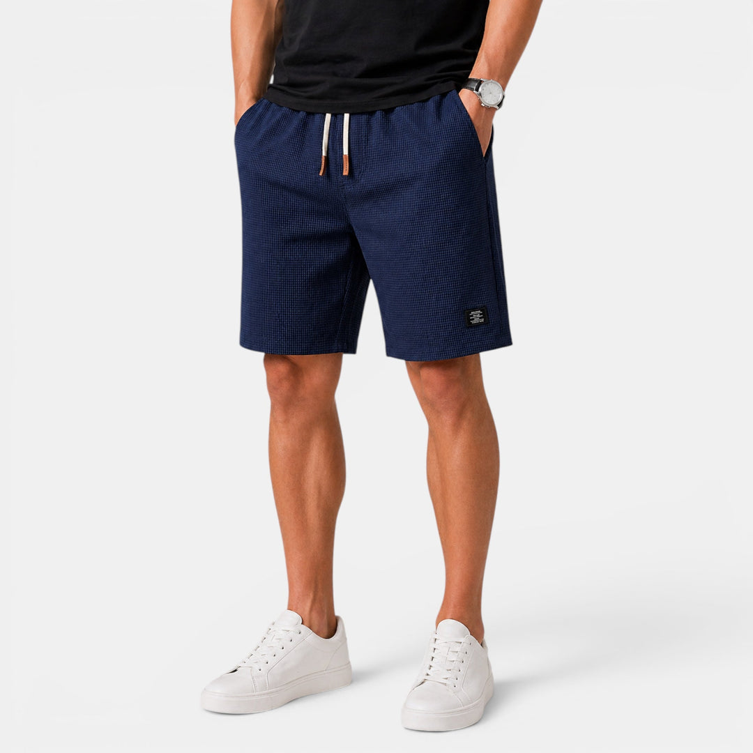 Men's casual summer shorts: relaxed fit, elastic waist, and practical pockets for warm weather comfort.