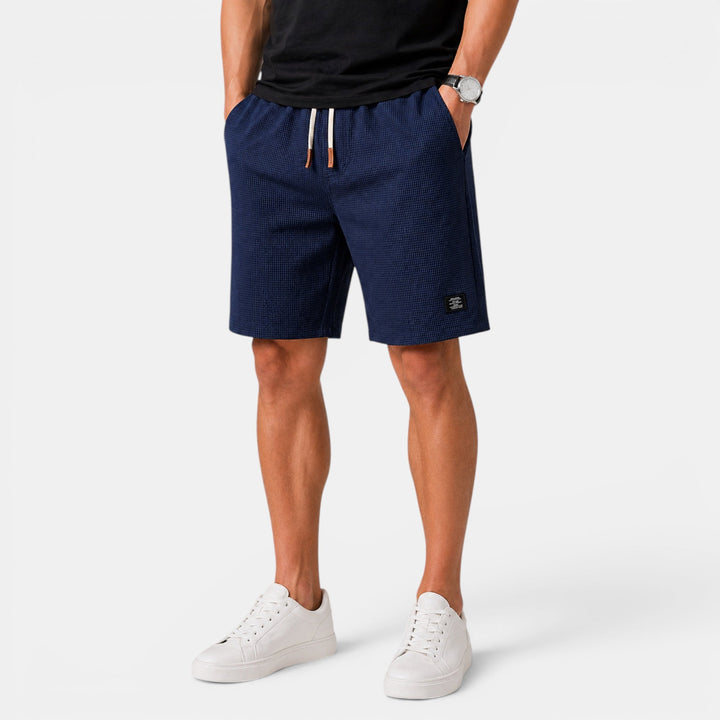 Men's casual summer shorts: relaxed fit, elastic waist, and practical pockets for warm weather comfort.