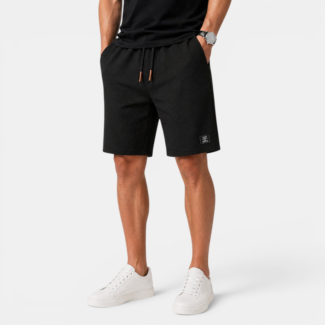 Everyday men's summer shorts with relaxed fit and elastic waist, great for warm weather activities.