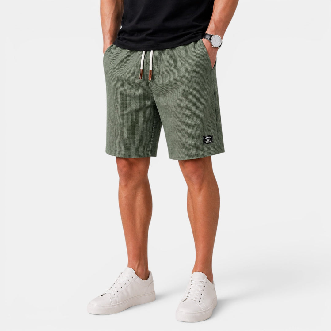 Classic men's relaxed fit summer shorts, elastic waist design for ultimate comfort & casual style.