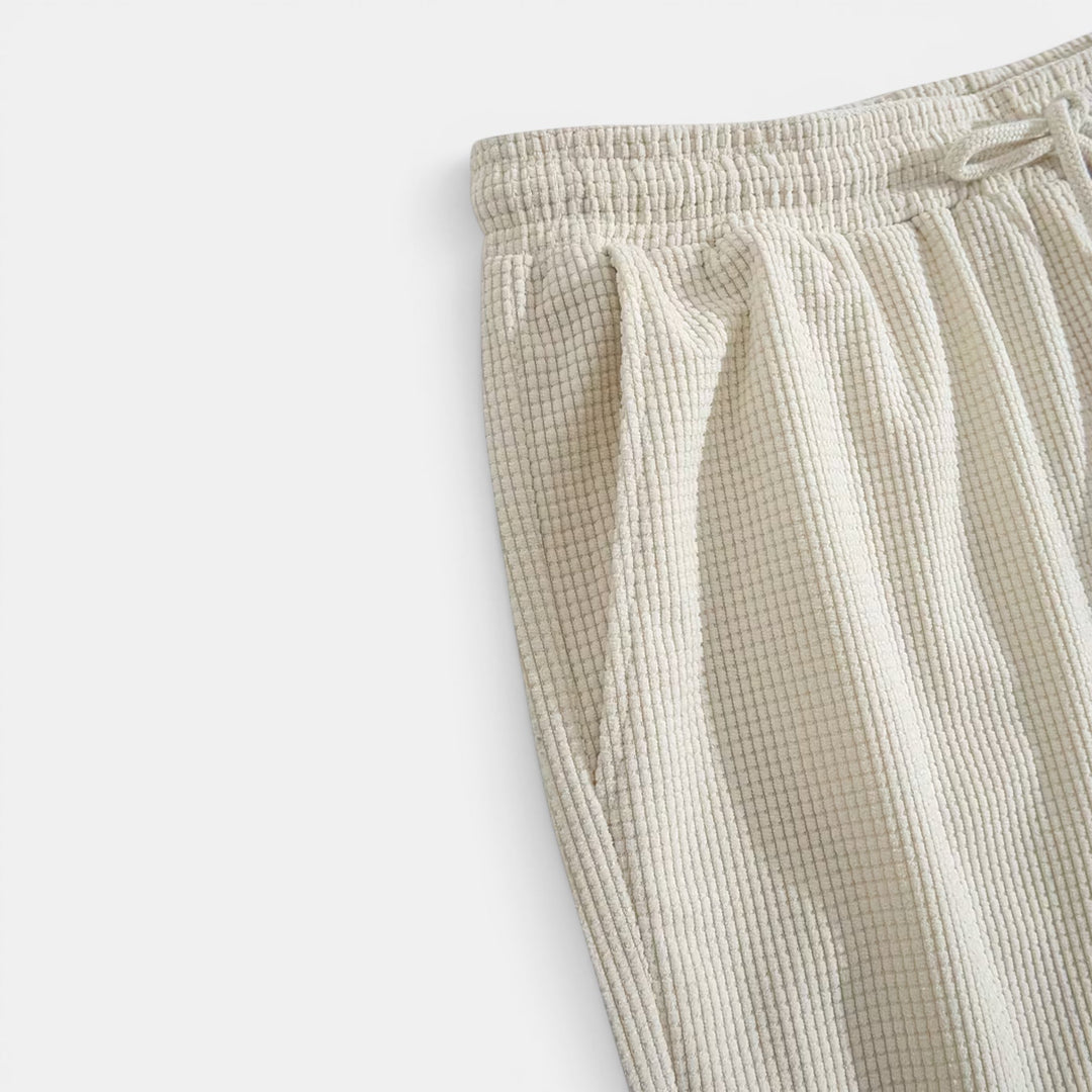 Relaxed fit men's summer shorts, featuring a comfortable elastic waist and useful side pockets.
