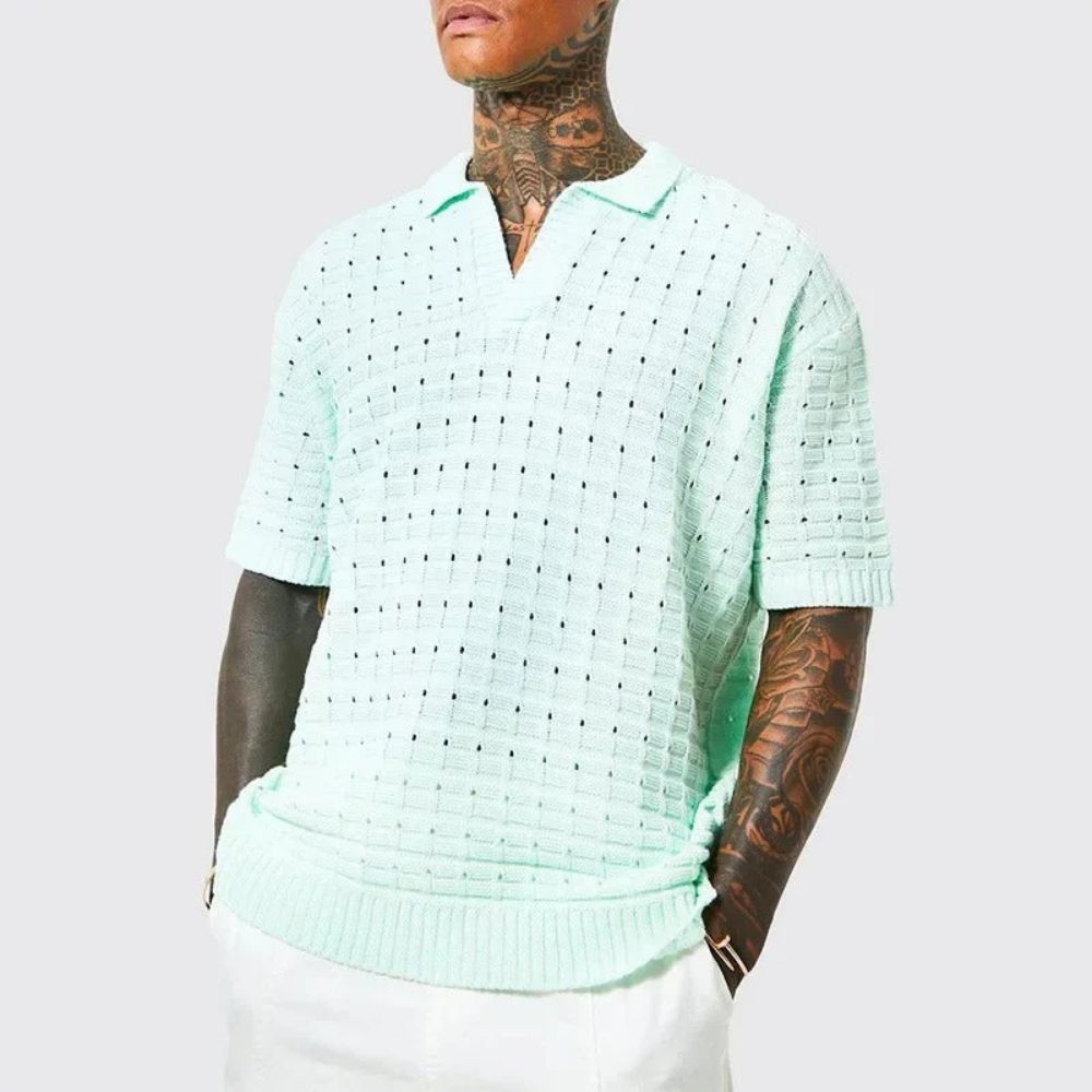 Knitted men's textured short sleeve polo shirt with a stylish v-neck, ideal for smart casual wear.