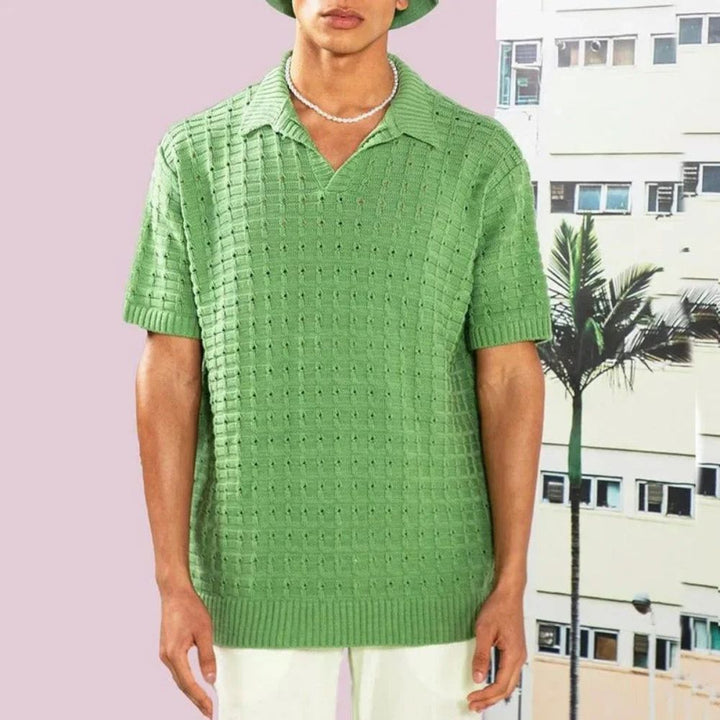 Stylish men's textured knit polo shirt, short sleeve, v-neck design, great for smart casual events.