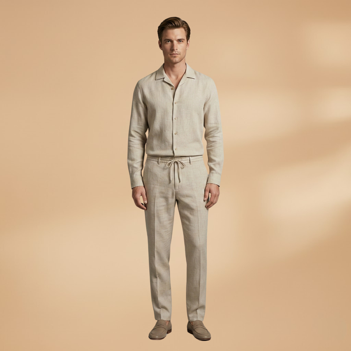 Casual men's long-sleeve shirt and matching relaxed fit trousers co-ord set, perfect for summer.