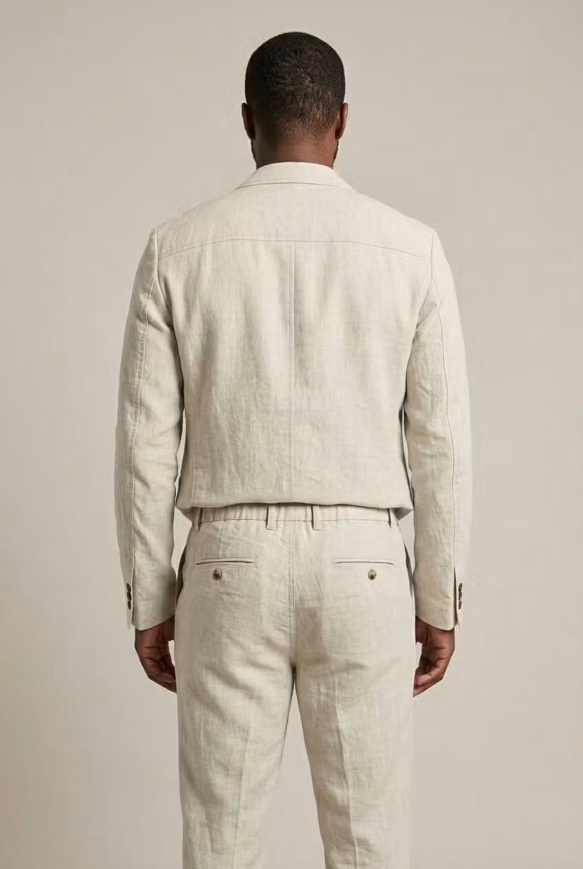 Comfortable men's two-piece suit featuring a relaxed fit blazer and matching dress pants for events.