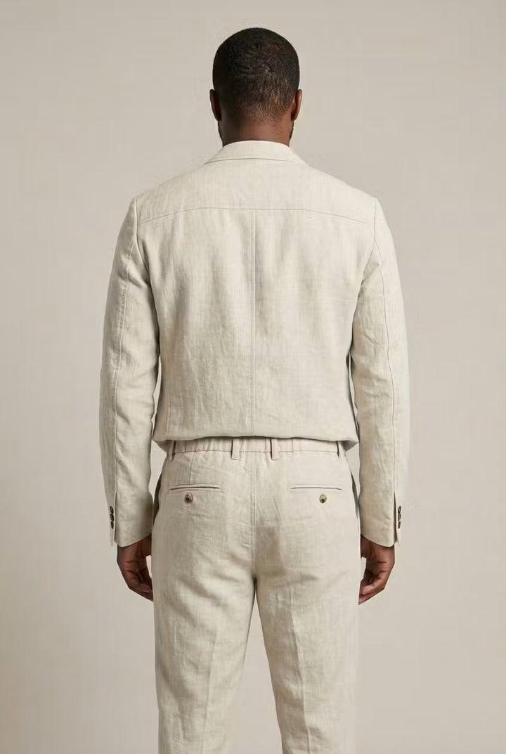 Comfortable men's two-piece suit featuring a relaxed fit blazer and matching dress pants for events.