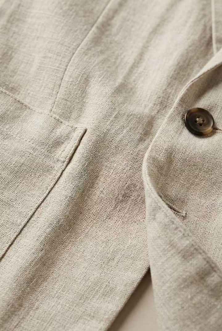 Modern men's relaxed fit suit: a versatile two-piece blazer and pant set for effortless spring fashion.