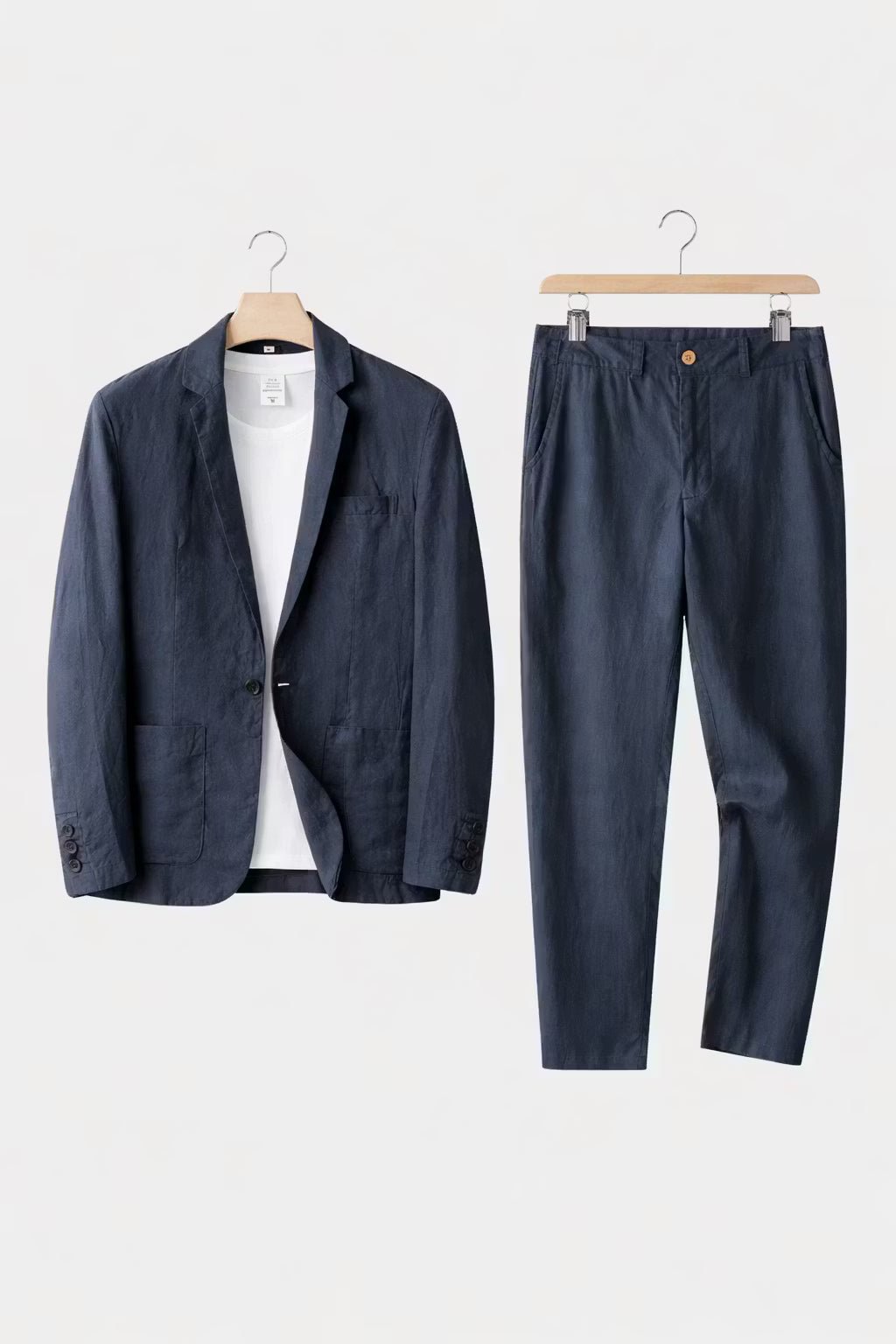 Effortless men's relaxed fit suit, a versatile two-piece set with blazer & dress pants for various occasions.