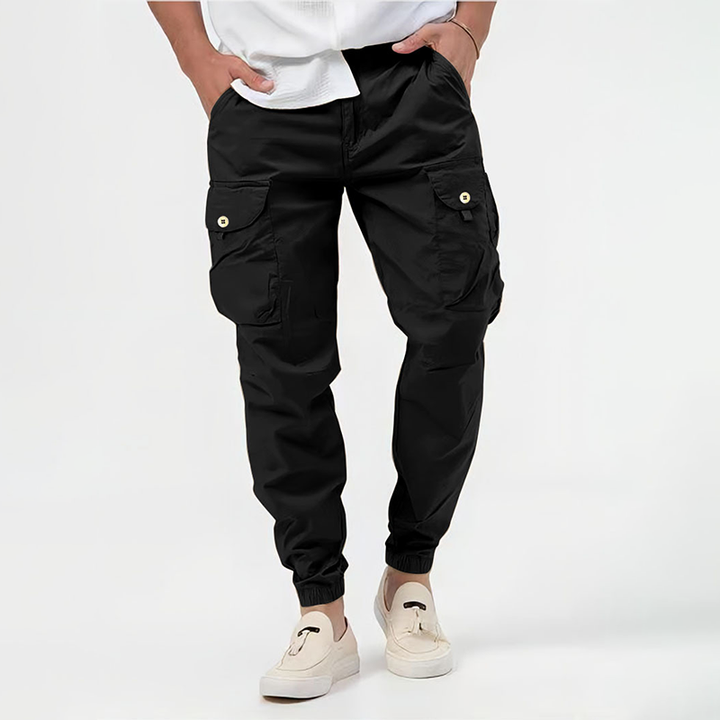 Durable men's cargo pants in a relaxed fit, featuring a comfortable drawstring waist and practical utility pockets.