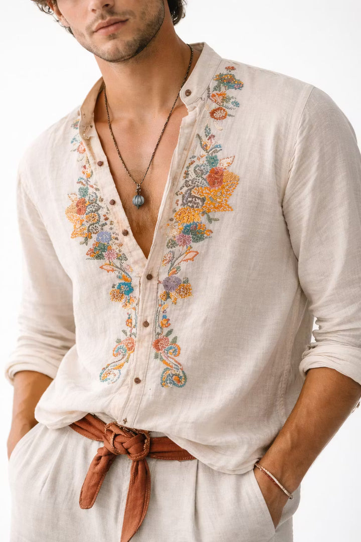 Casual men's relaxed fit V-neck shirt, featuring detailed floral embroidery, ideal for a stylish spring look.