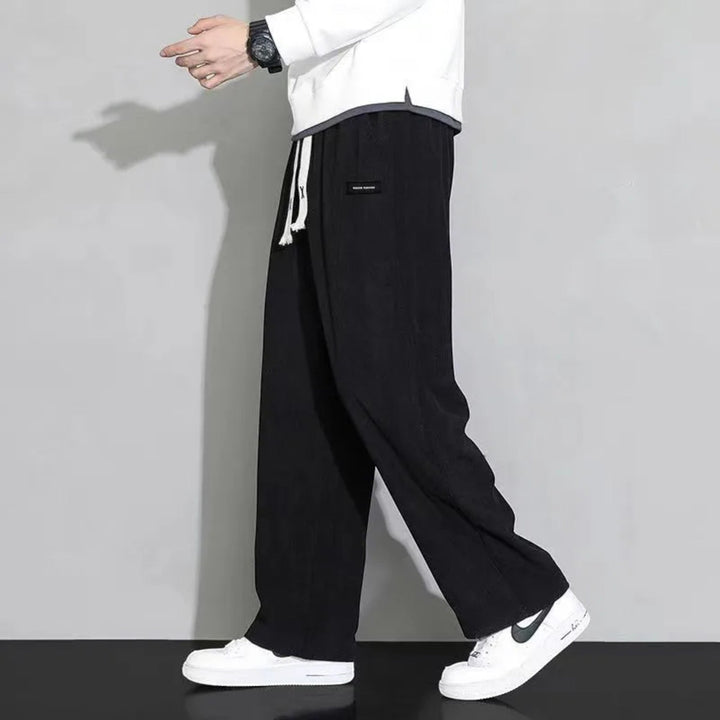 Dark gray men's wide leg sweatpants, relaxed fit loungewear with adjustable drawstring for ultimate comfort.