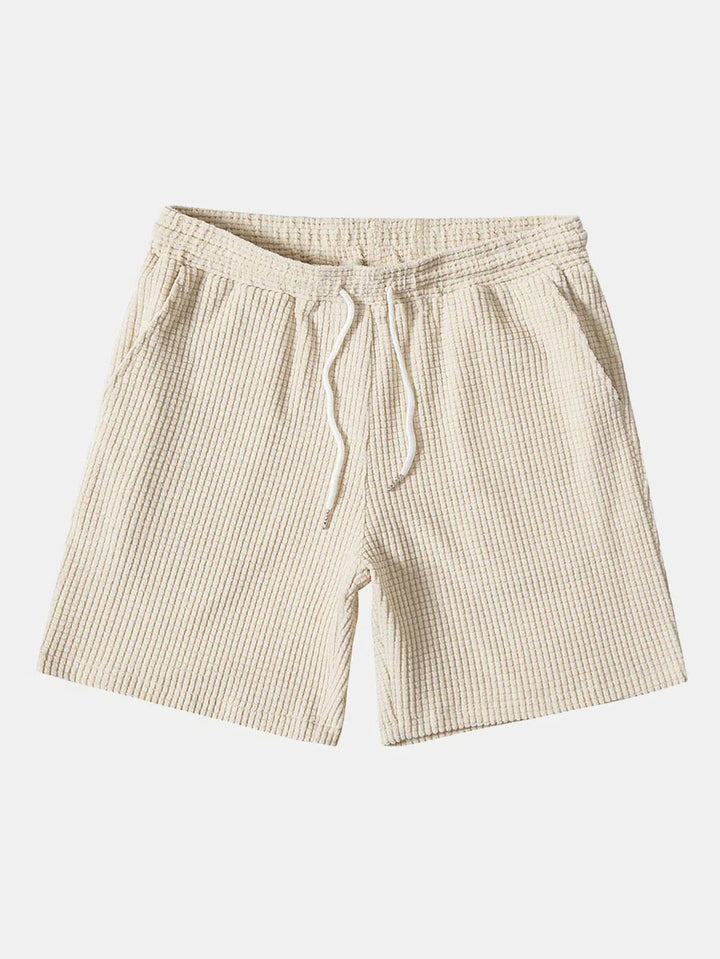 Summer fashion: Men's two-piece relaxed fit short sleeve shirt and shorts set for casual comfort.