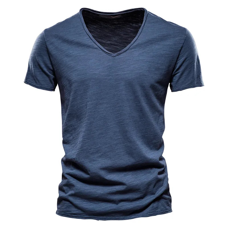 Men's relaxed V-neck summer shirt in lightweight fabric for cool, effortless casual style.