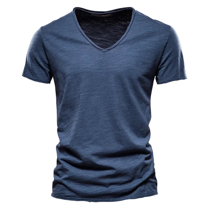 Men's relaxed V-neck summer shirt in lightweight fabric for cool, effortless casual style.