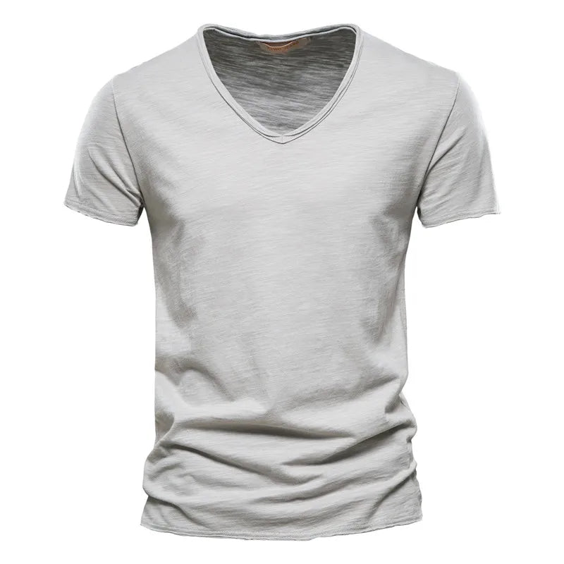Casual men's summer V-neck shirt, offering cool comfort & an effortless relaxed fit for daily wear.