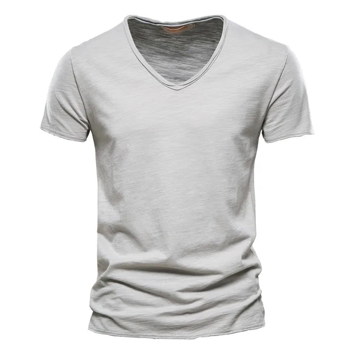 Casual men's summer V-neck shirt, offering cool comfort & an effortless relaxed fit for daily wear.