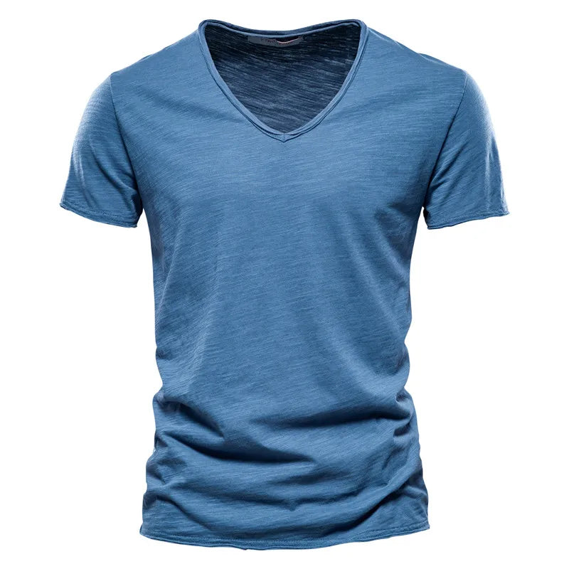 Lightweight men's relaxed V-neck shirt, ideal for stylish summer outfits & ultimate comfort.