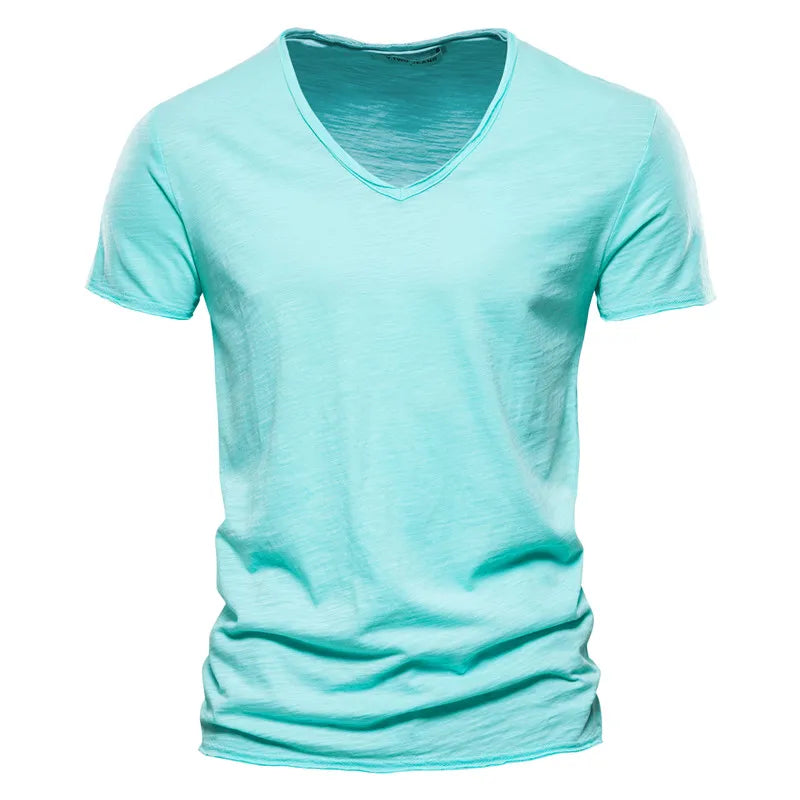 Model wearing a men's relaxed V-neck summer shirt, highlighting its cool & casual short sleeve style.
