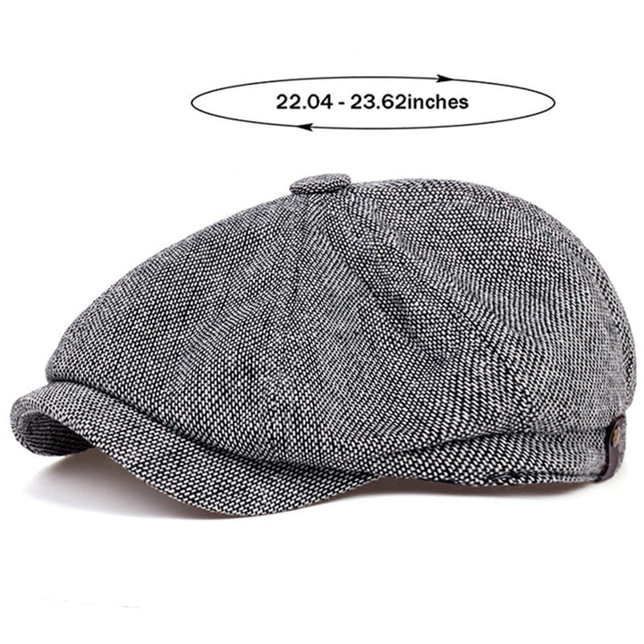 Casual men's look completed with a stylish herringbone flat cap, creating a chic retro vintage vibe.