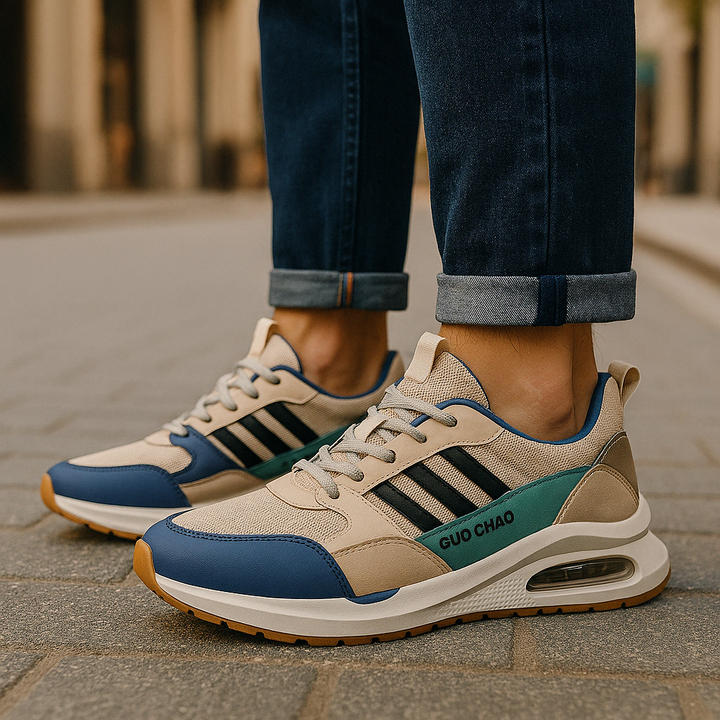 Cushioned men's retro sneakers. Sporty vintage footwear in beige, green & orange for ultimate comfort.