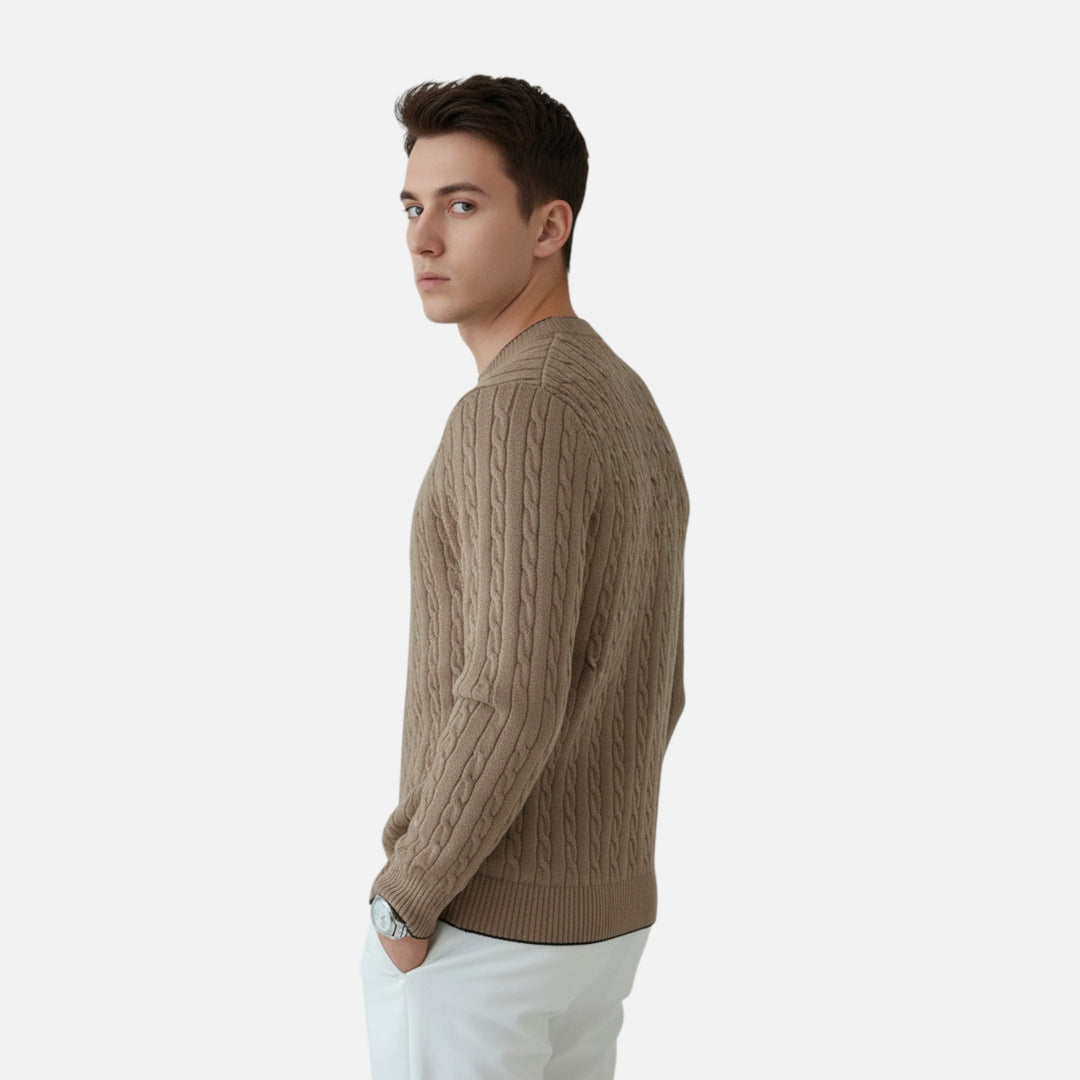 Stylish man wearing a casual ribbed crew neck sweater, long sleeve, suitable for comfortable autumn wear.