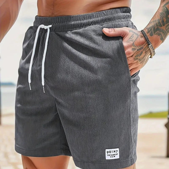 Casual men's summer shorts, ribbed knit fabric, classic drawstring style for everyday comfort.