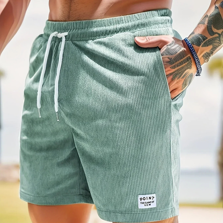 Men's athletic shorts: ribbed, drawstring, comfortable for active wear and men's apparel.