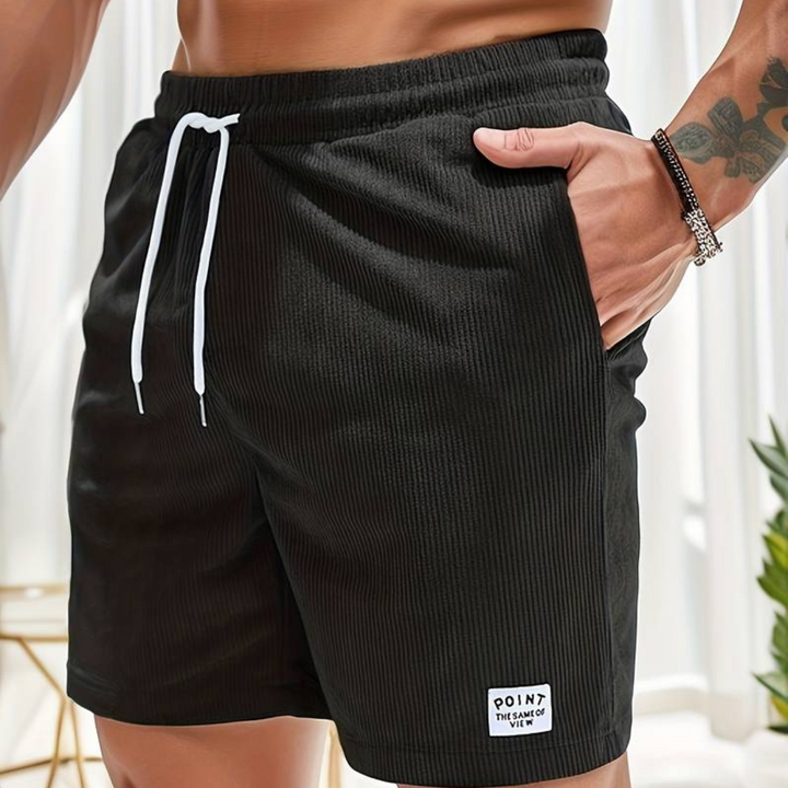 Stylish men's casual shorts, ribbed texture, elastic drawstring waist for men's fashion.