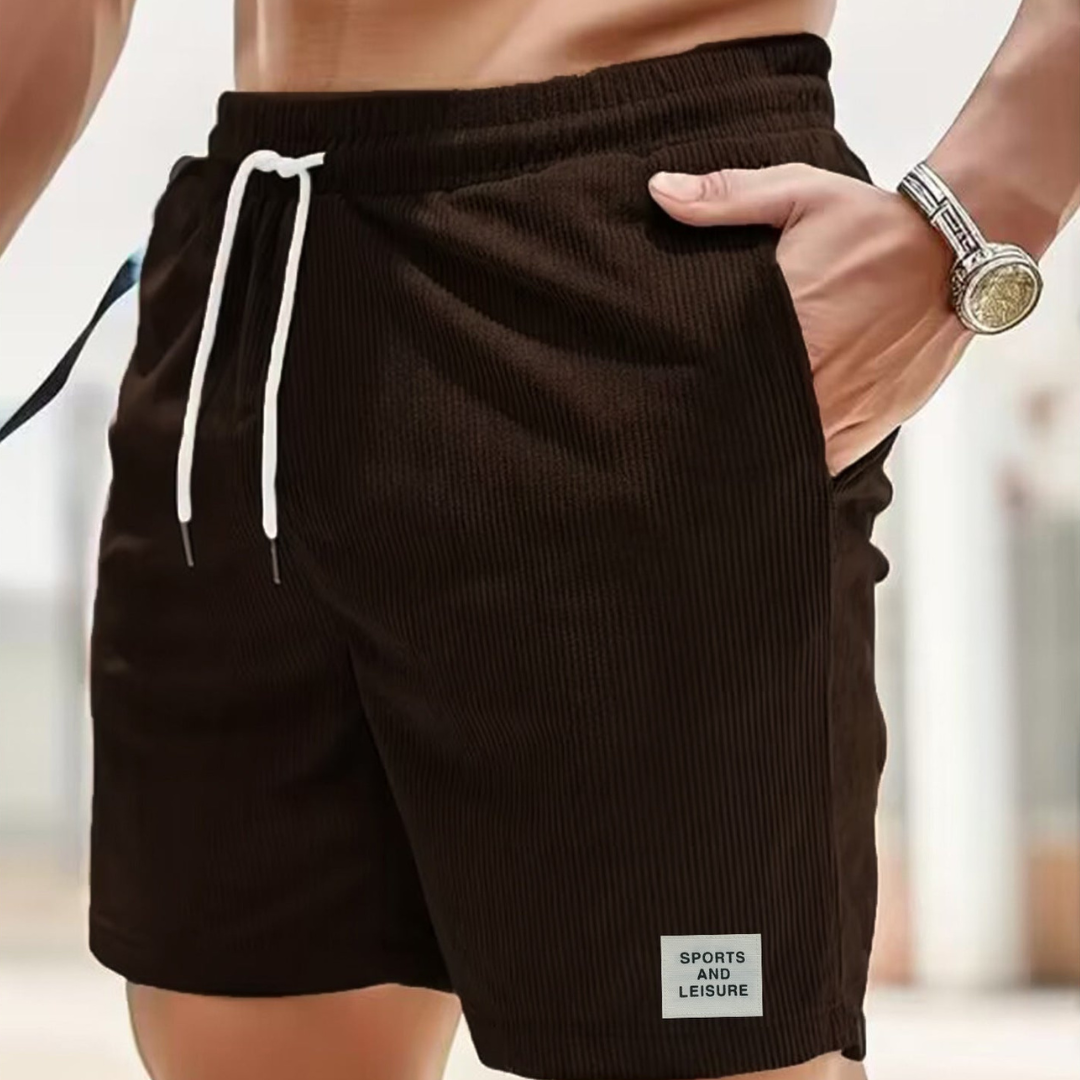 Athletic men's shorts, ribbed texture, drawstring for a secure fit during activities.