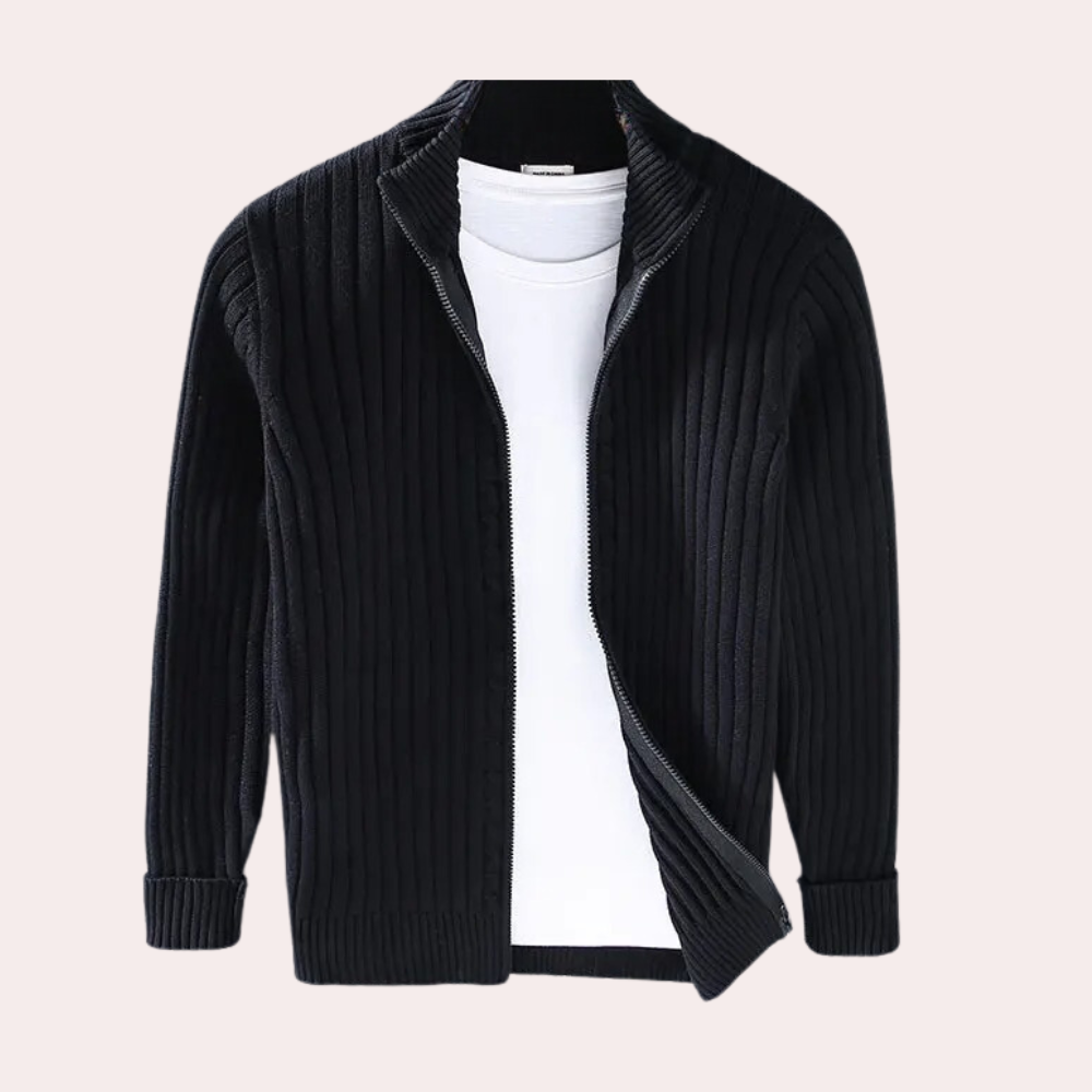 Man wearing a fashionable ribbed knit zip-up jacket, ideal for layering in cooler weather.