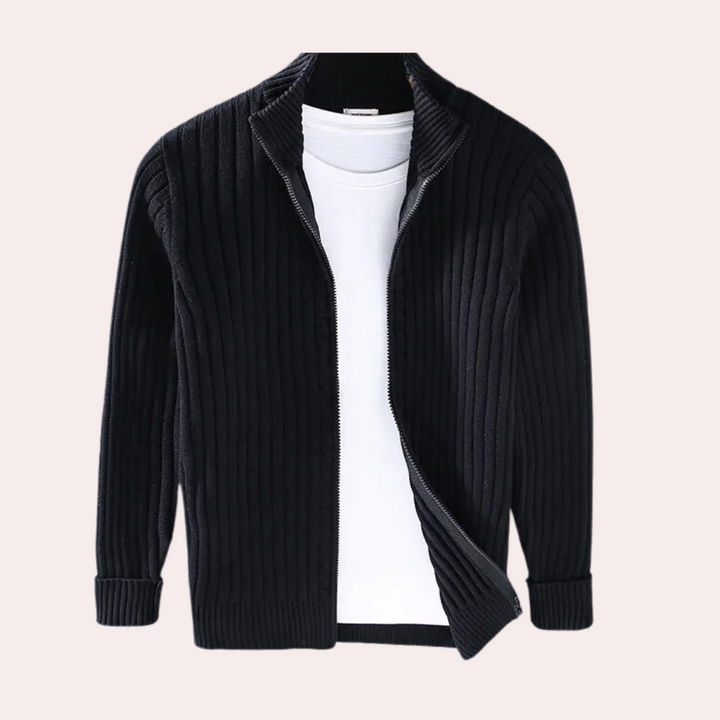 Man wearing a fashionable ribbed knit zip-up jacket, ideal for layering in cooler weather.