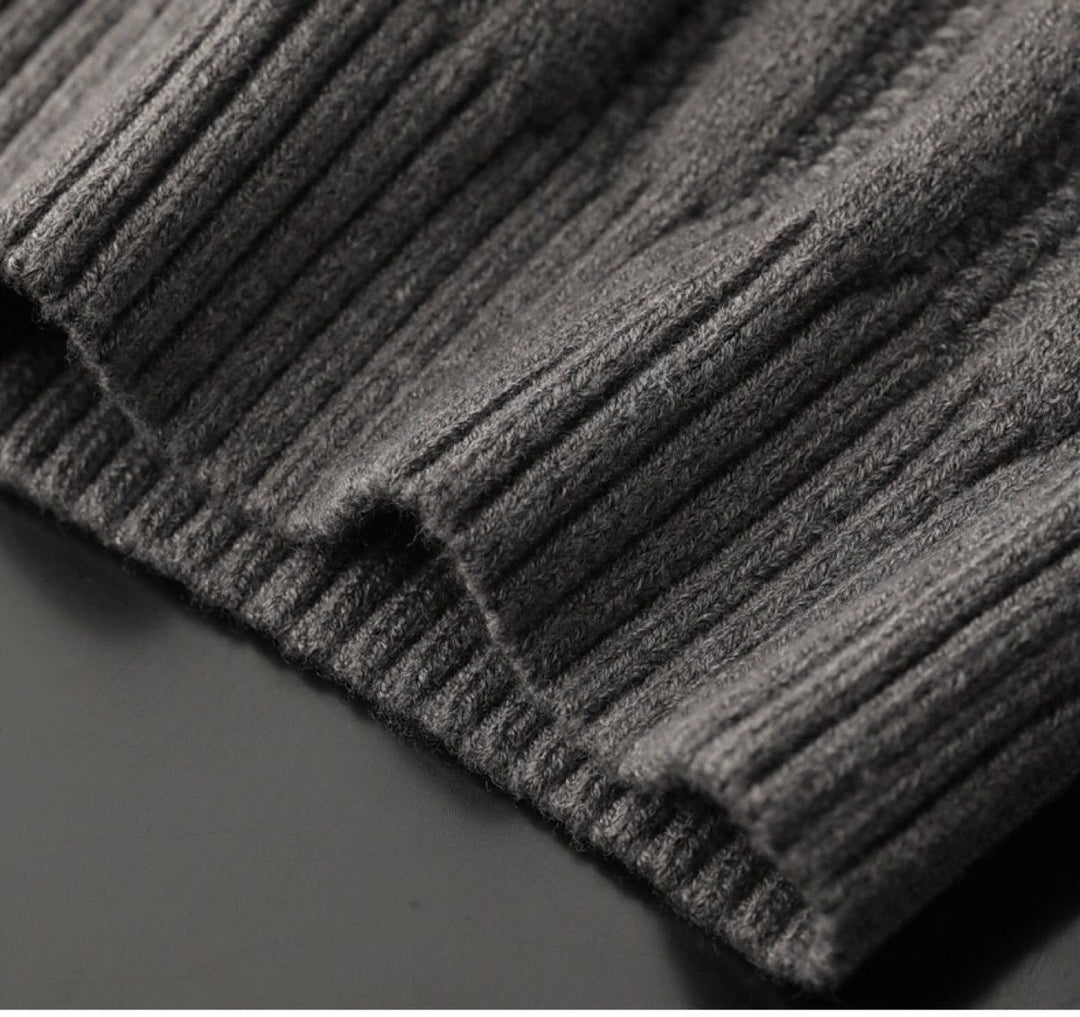 Premium men's long sleeve sweater, featuring a distinctive ribbed pattern and elegant polo collar for comfort.