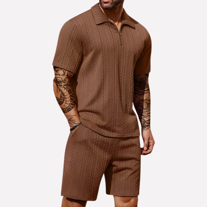 Casual men's two-piece set featuring a ribbed polo shirt & matching shorts, ideal for summer.