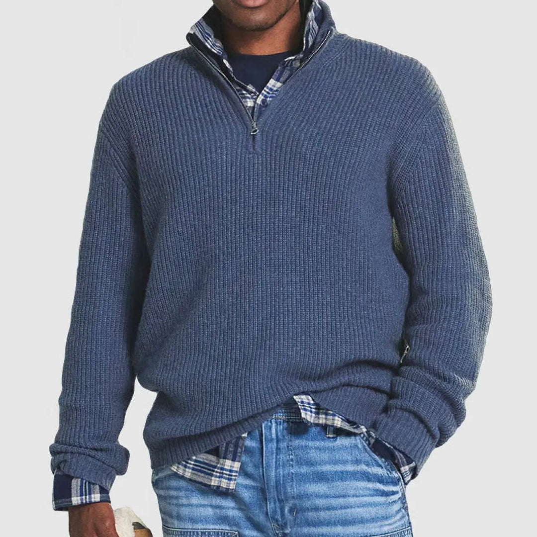 Stylish men's quarter-zip sweater with ribbed knit texture, ideal for smart casual or business casual outfits.