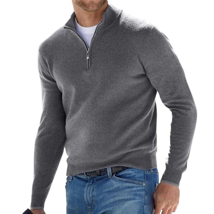 Comfortable men's half-zip ribbed sweater, great for layering over shirts or under jackets for a smart look.