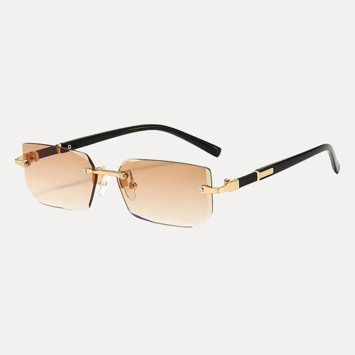 Close-up of men's rimless rectangle sunglasses, showcasing the stylish gold frame & clear lenses.