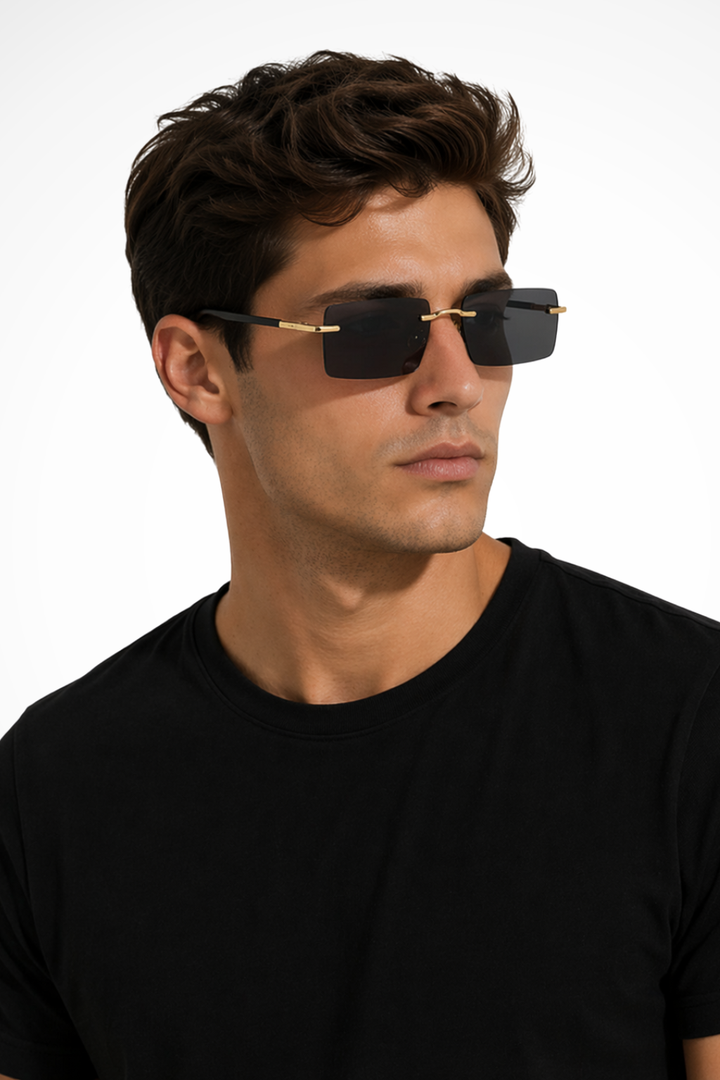 Men's rimless rectangle sunglasses with gold accents, sleek design, and UV protection.
